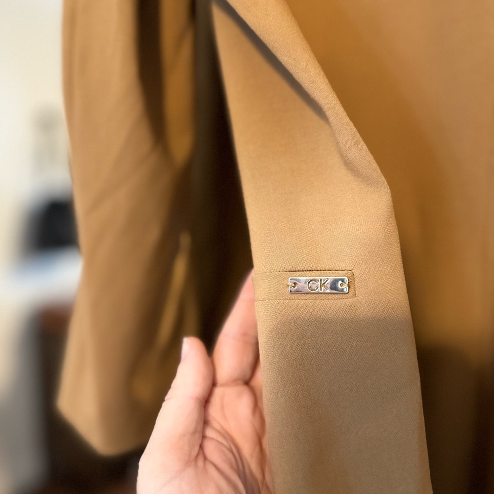 Beautiful brand new Calvin Kline open front jacket.